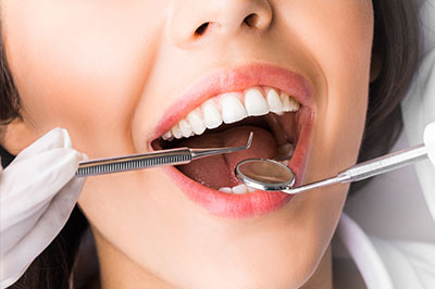 Modern Dental Care of Queens | Preventative Program, Dentures and Dental Bridges